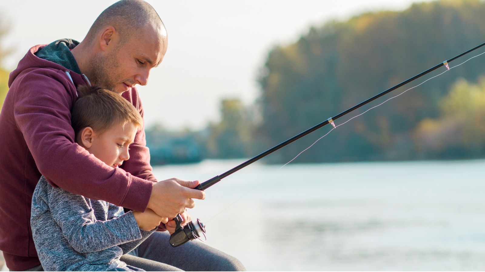 Father and son recreationally fishing in Wisconsin.