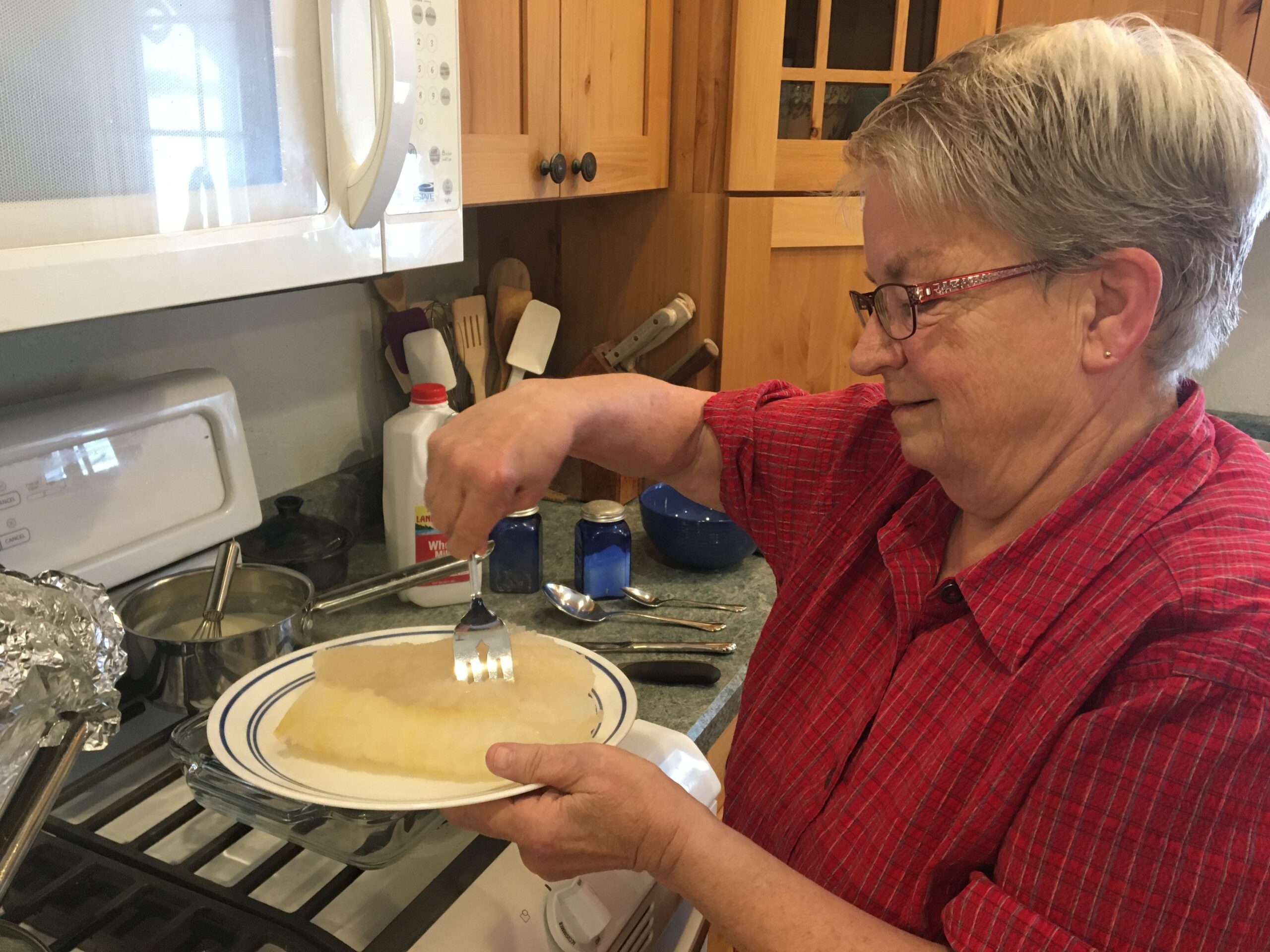 Mary Childs serves lutefisk